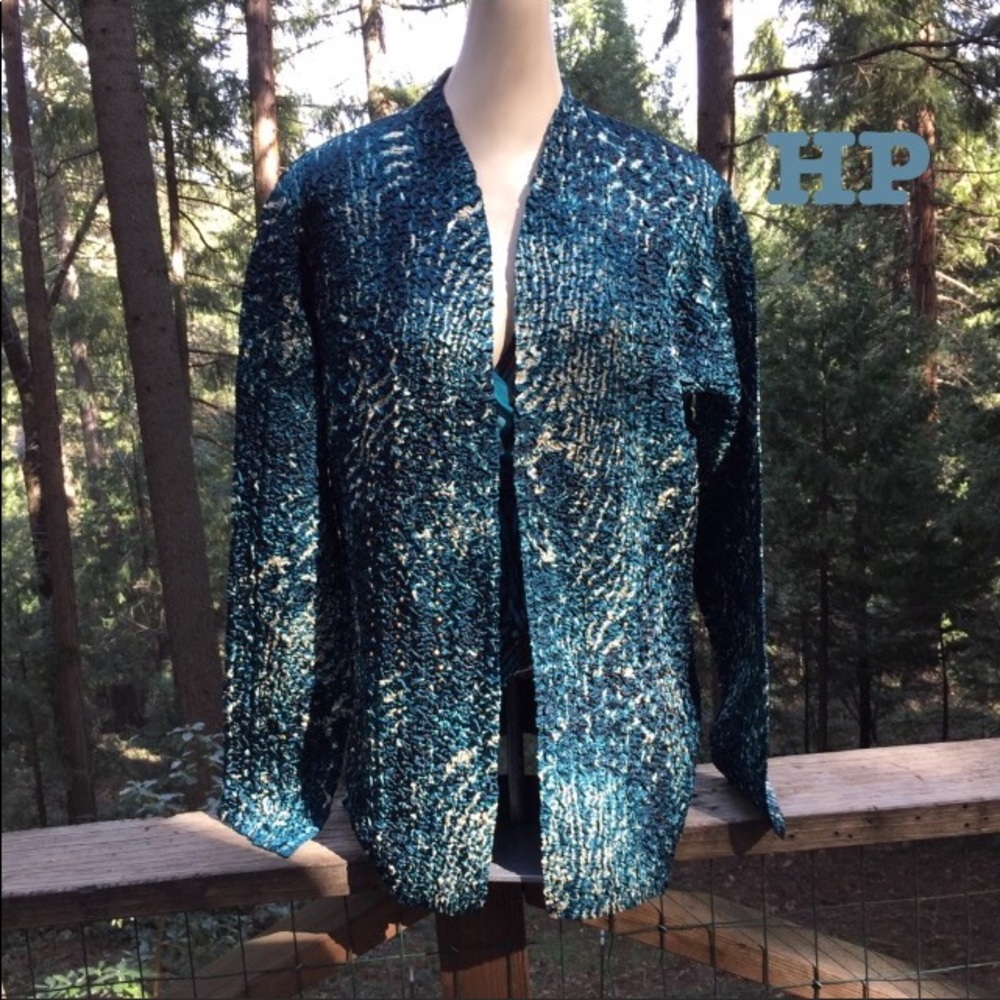Scrunchy silky evening jacket is shades of blue,HP